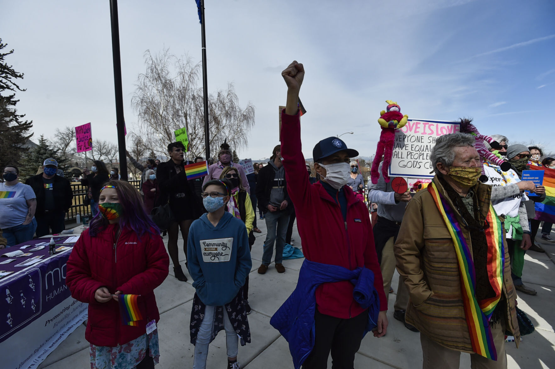 Demonstrators gather on the step of the Montana State Capitol